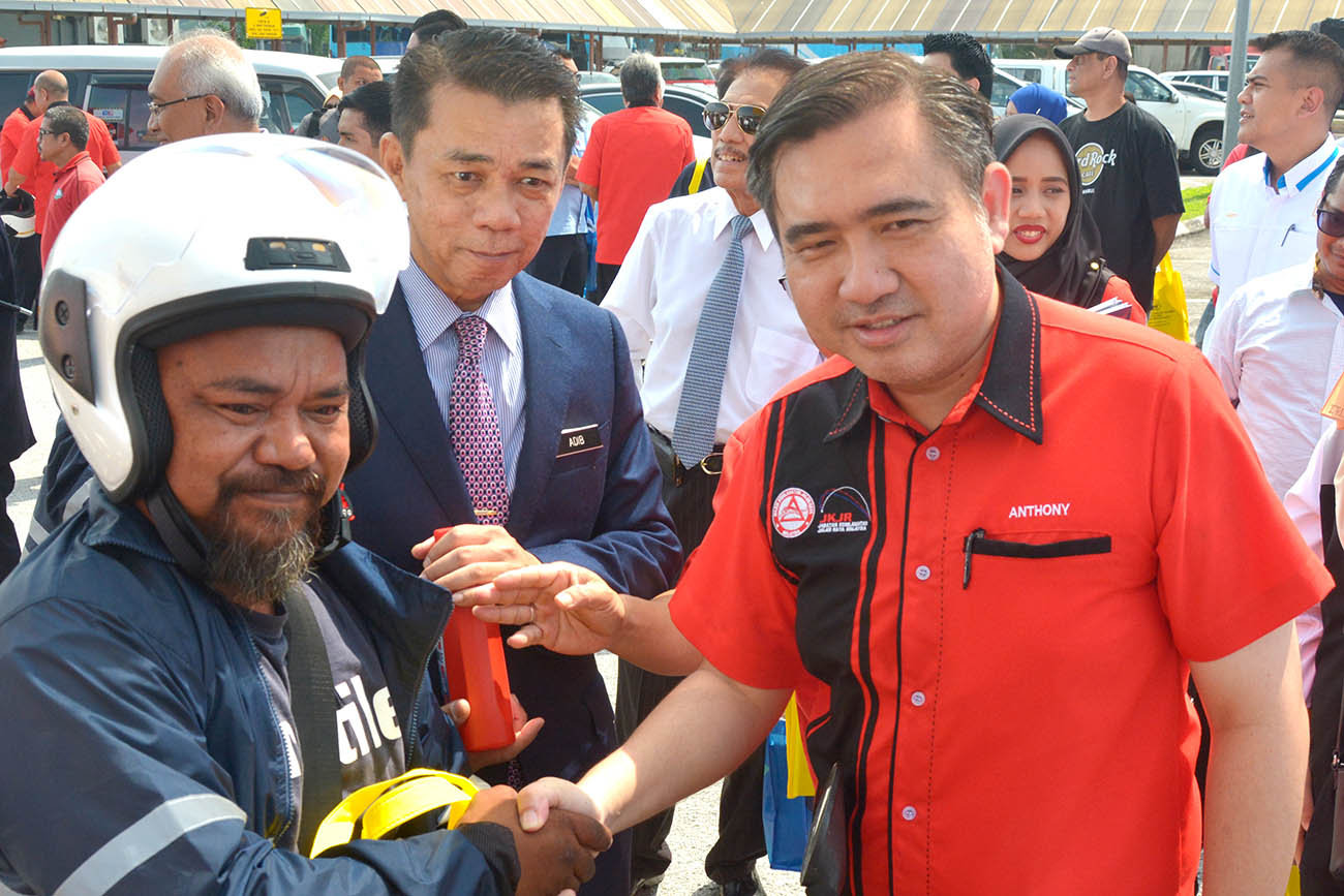 Anthony Loke (in red), file pic