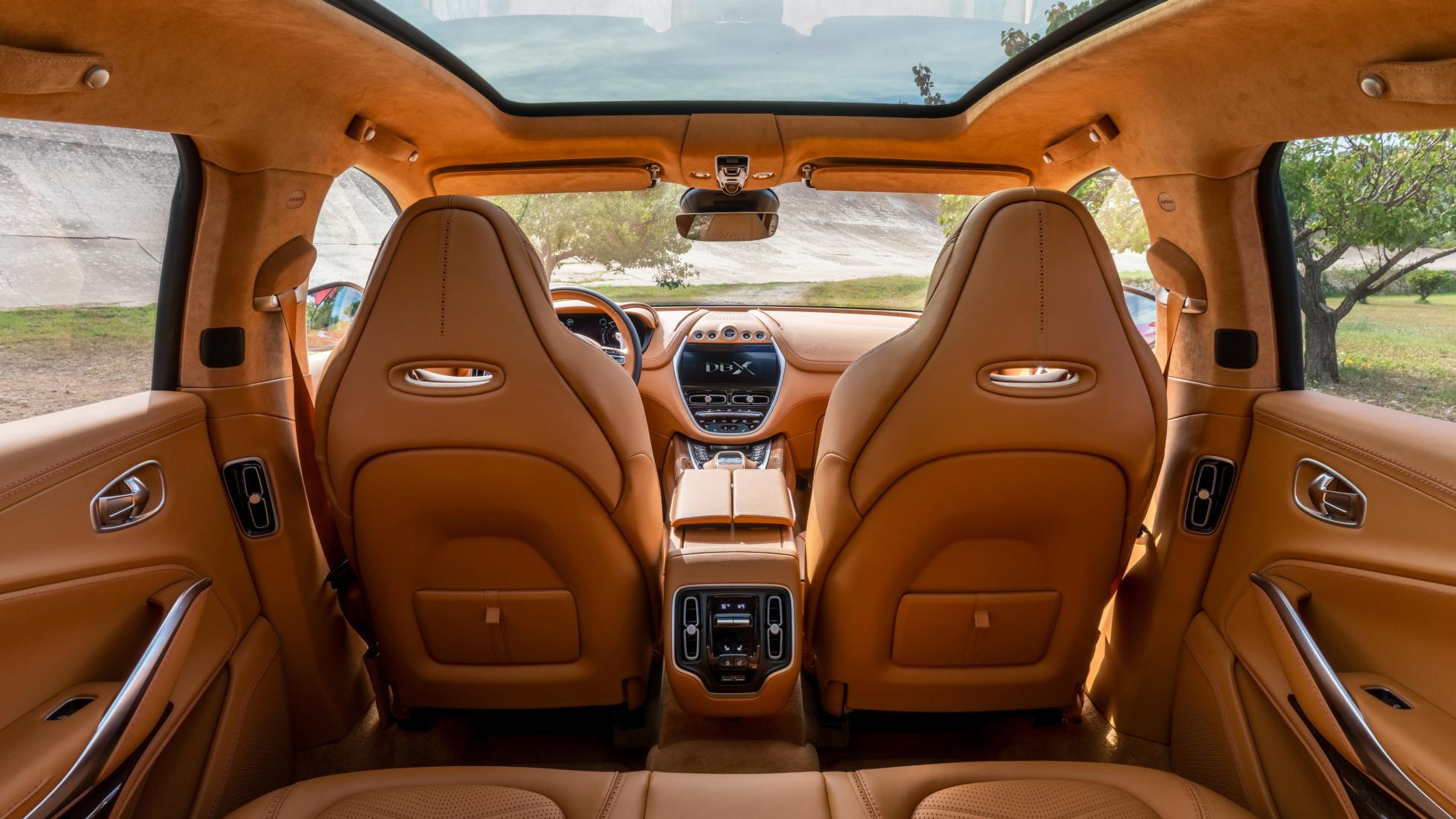 Here, have a sit inside the Aston Martin DBX SUV